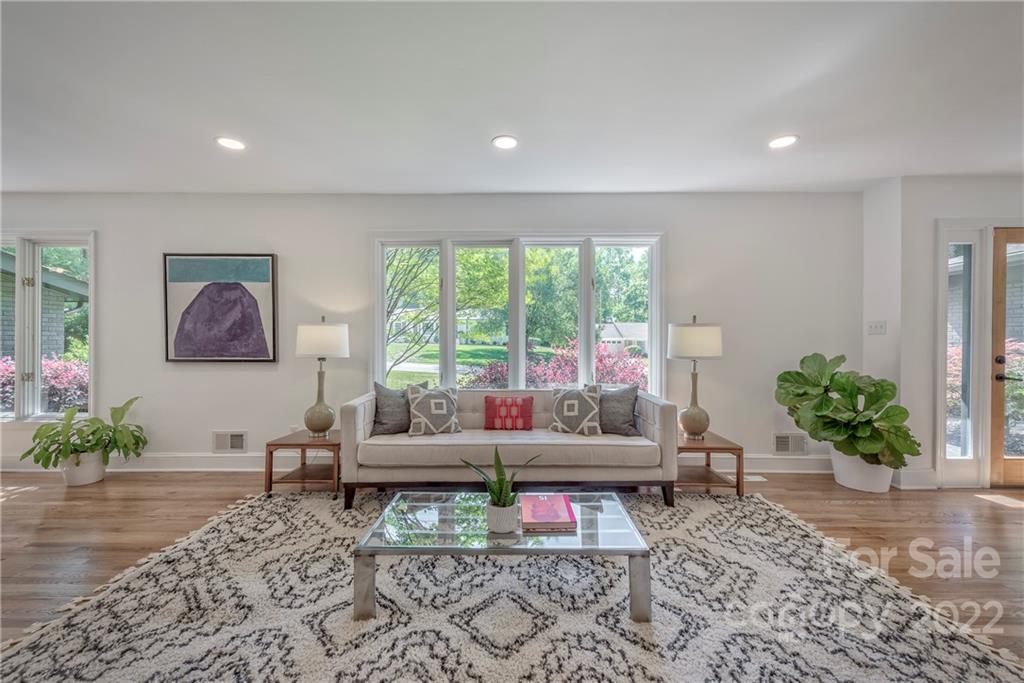 1139 Shady Bluff Drive Charlotte, NC 28211 - Photo 8 of 46 a living room with furniture and a potted plant