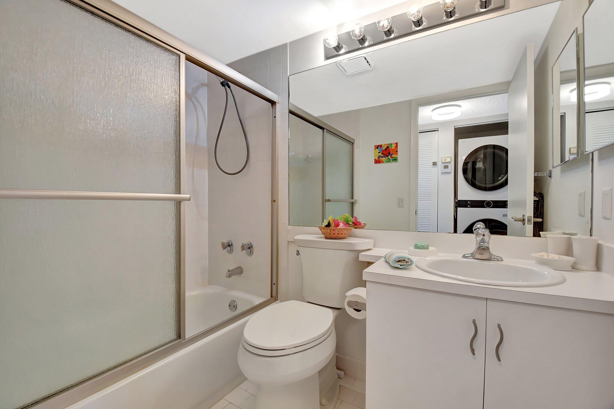 621 Waterside Drive Hypoluxo, FL 33462 - Photo 14 of 27 a bathroom with a sink a toilet and shower