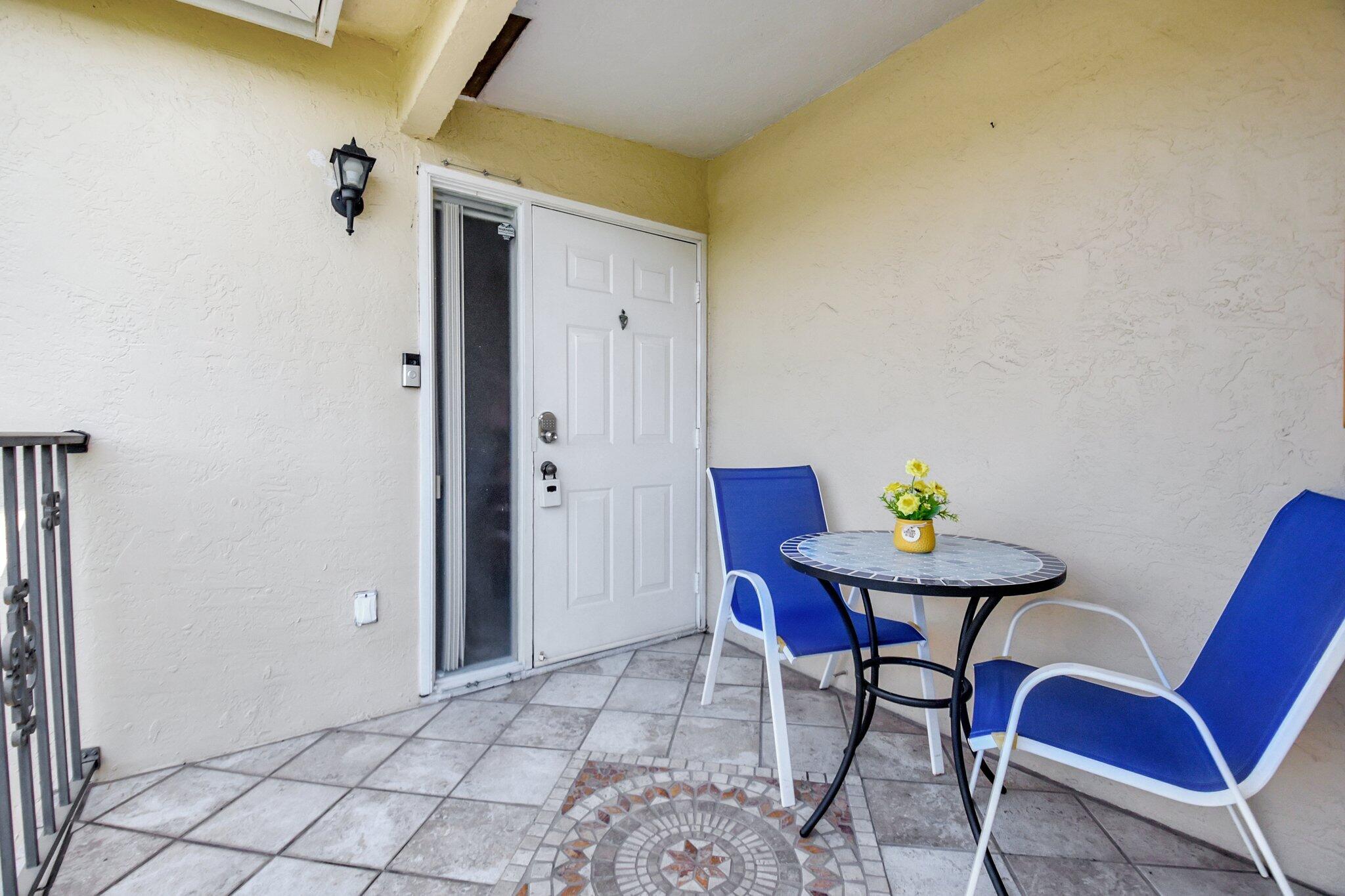 621 Waterside Drive Hypoluxo, FL 33462 - Photo 2 of 27 a view of a dining room with furniture