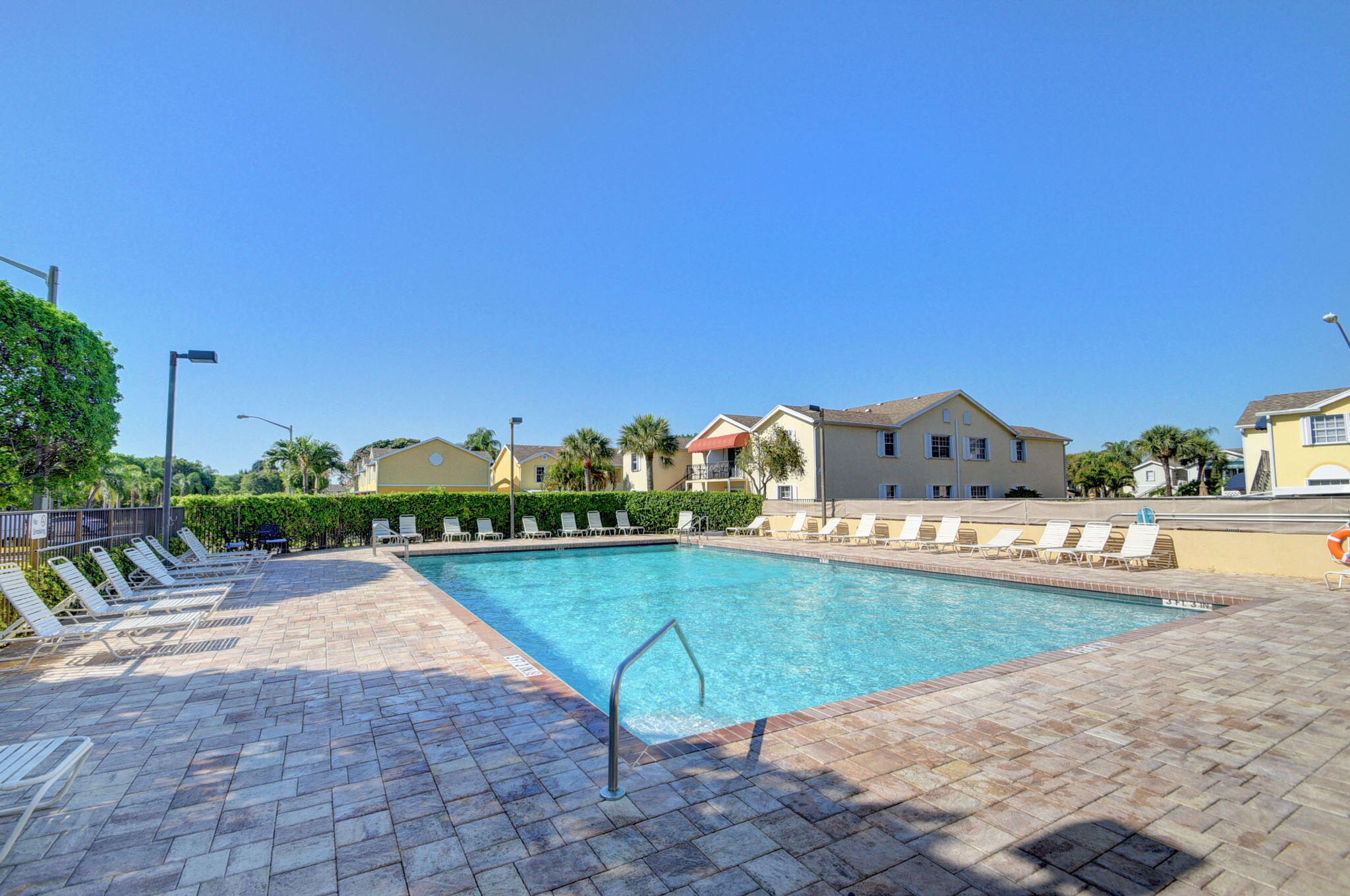 621 Waterside Drive Hypoluxo, FL 33462 - Photo 22 of 27 swimming pool view with a outdoor space