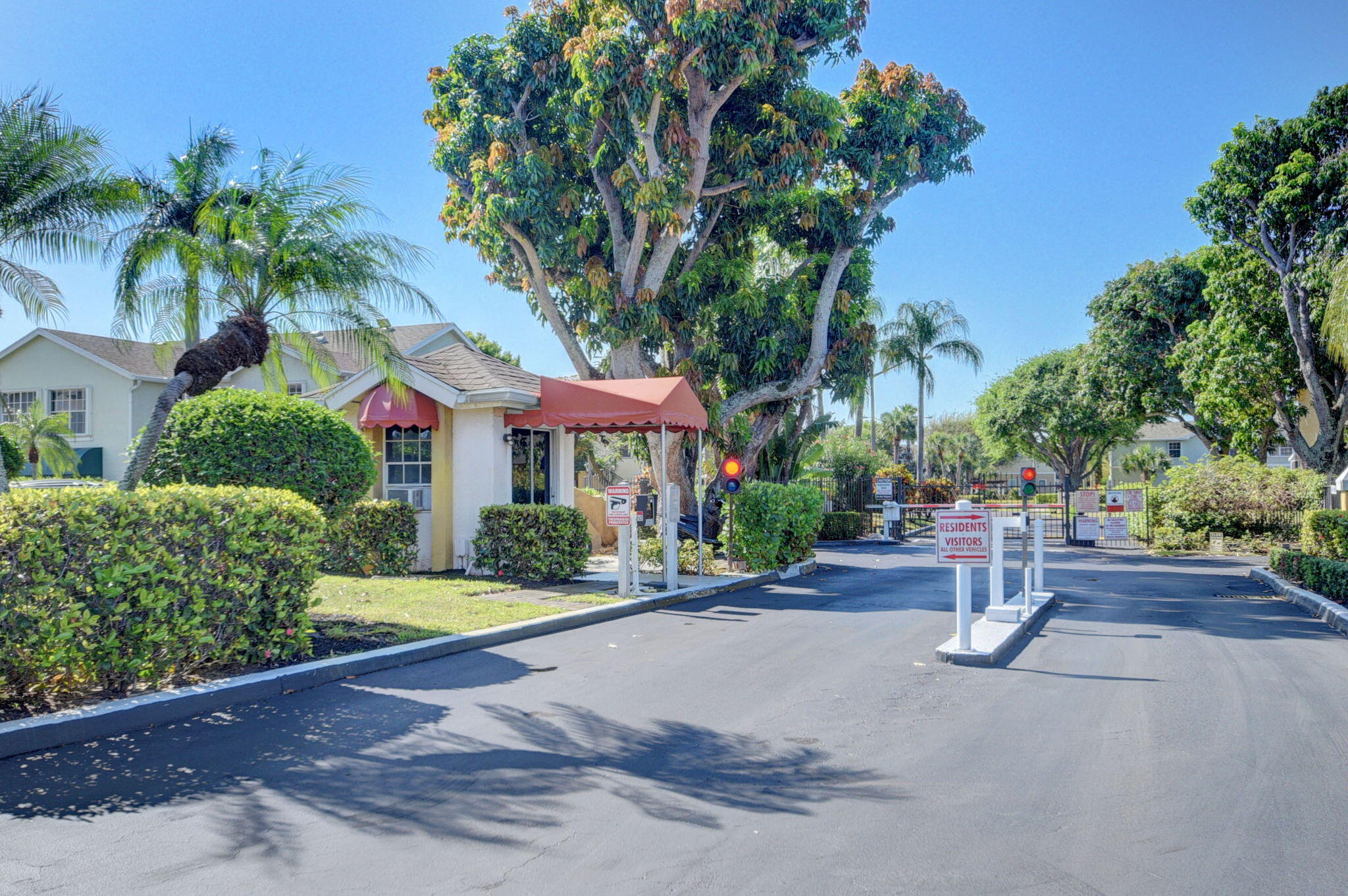621 Waterside Drive Hypoluxo, FL 33462 - Photo 23 of 27 a view of a park with plants and palm trees