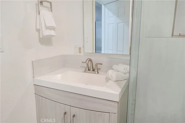 a stove top oven sitting inside of a kitchen