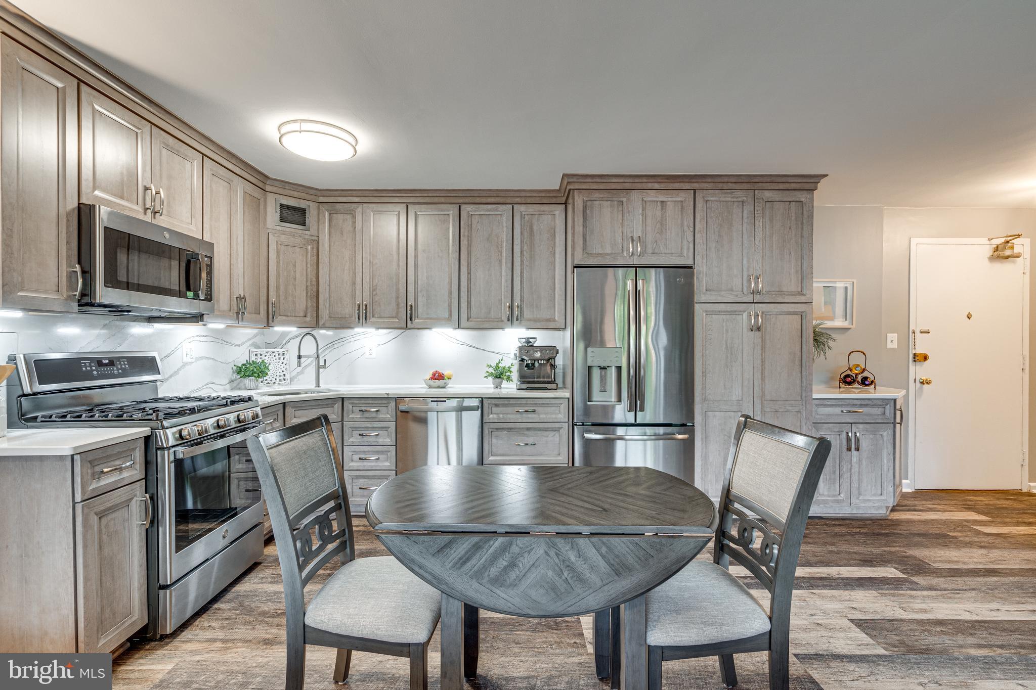 1300 South Arlington Ridge Road, Unit 311 Arlington, VA 22202 - Photo 9 of 39 SS Appliances and Quartzite Counters!