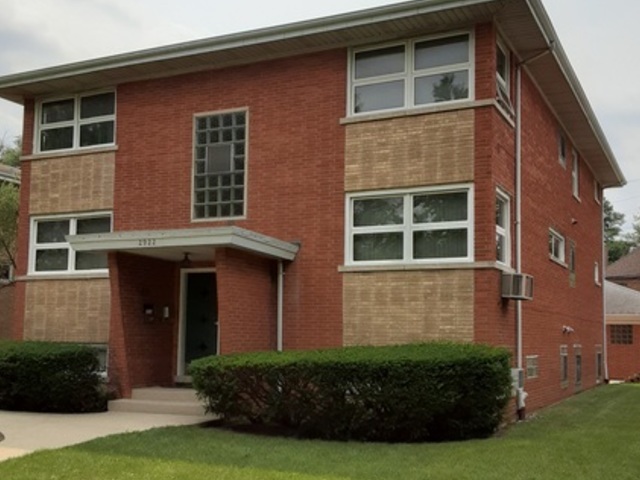 2922 Harlem Avenue Riverside, IL 60546 - Photo 4 of 4 a view of a house with potted plants and a yard