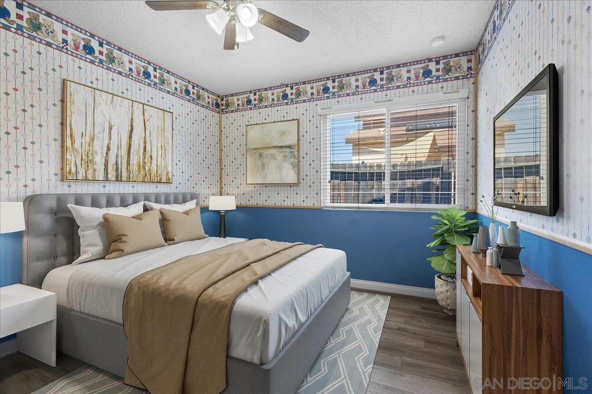 10738 2nd Street Santee, CA 92071 - Photo 21 of 52 a bedroom with a bed table and a window