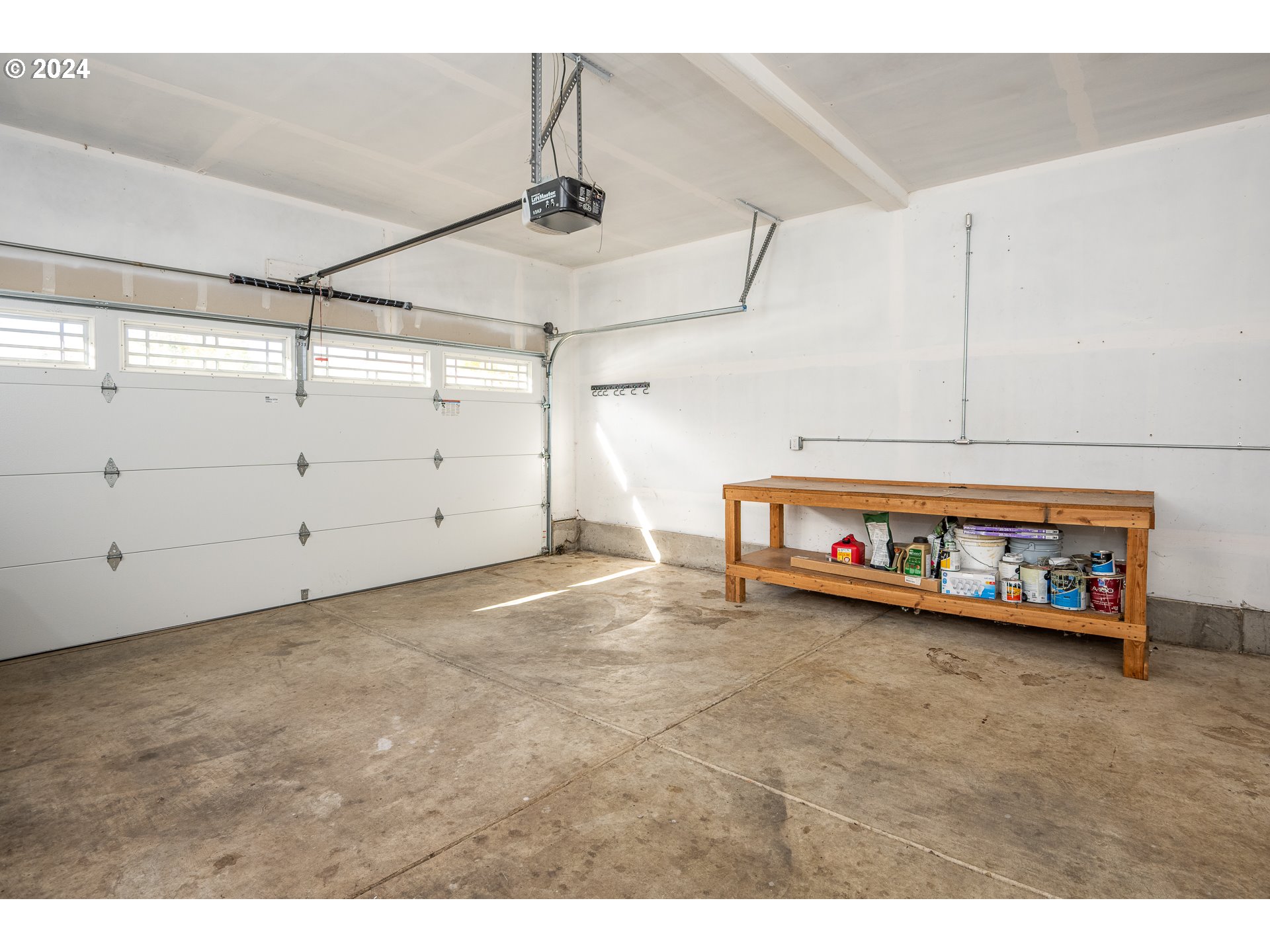 1455 South 58th Street Springfield, OR 97478 - Photo 20 of 39 a view of a garage with furniture