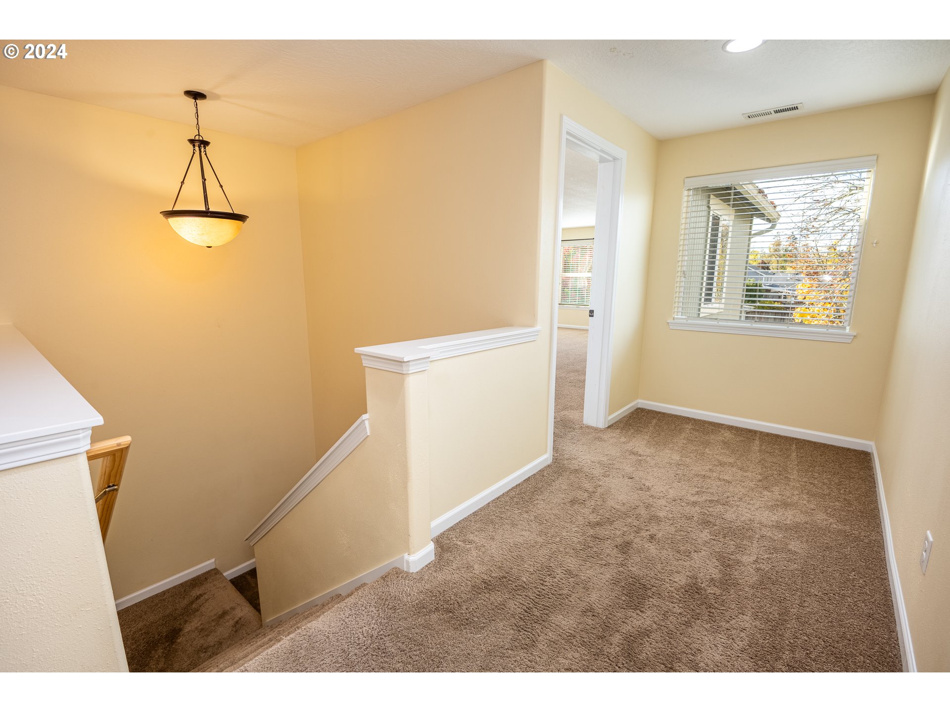 1455 South 58th Street Springfield, OR 97478 - Photo 23 of 39 a view of a room with window and stairs
