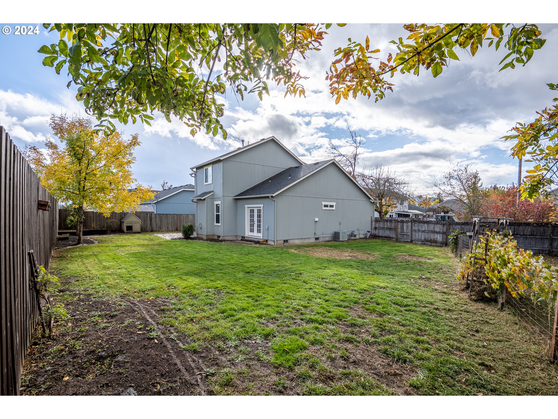 1455 South 58th Street Springfield, OR 97478 - Photo 33 of 39 a view of a house with a yard