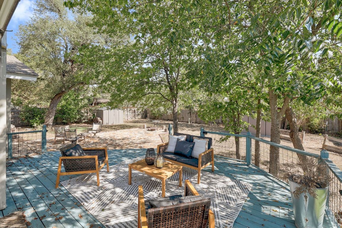 12511 Tree Line Drive Austin, TX 78729 - Photo 6 of 19 a view of backyard with furniture