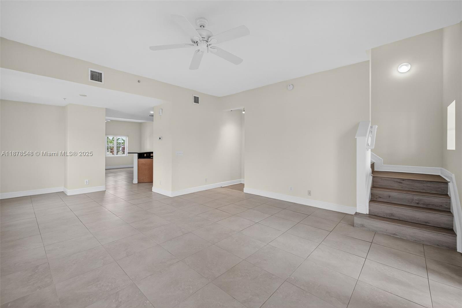 27 Southwest 6th Court Pompano Beach, FL 33060 - Photo 13 of 70 a view of an empty room with a window