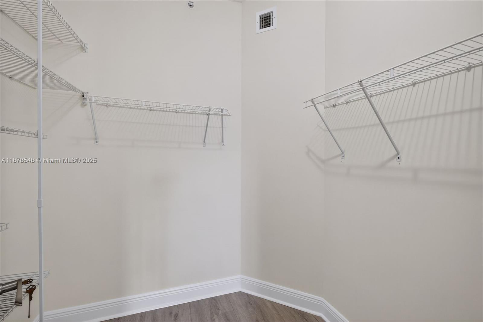 27 Southwest 6th Court Pompano Beach, FL 33060 - Photo 24 of 70 a view of a room with racks on the wall