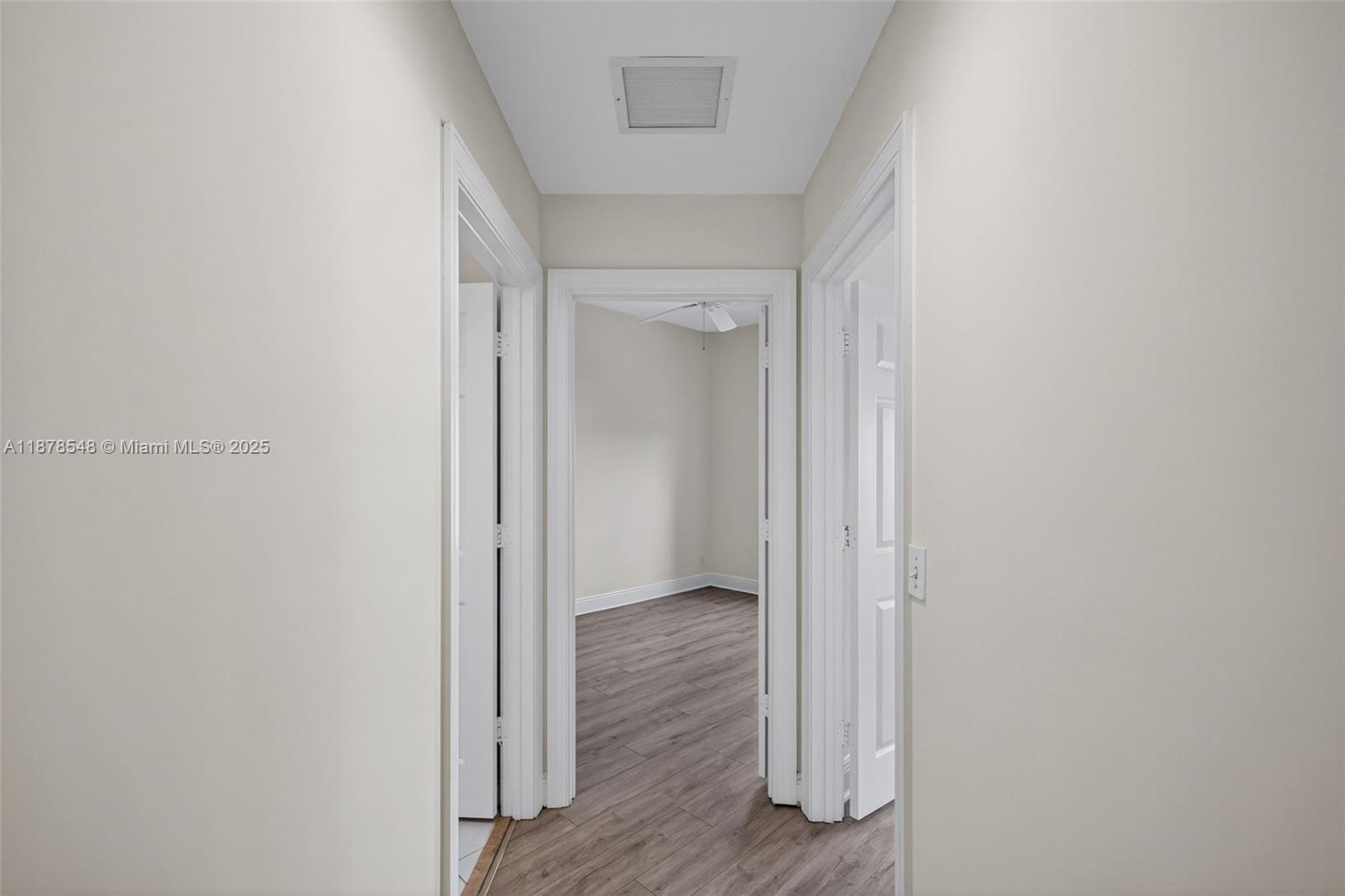 27 Southwest 6th Court Pompano Beach, FL 33060 - Photo 28 of 70 a view of hallway with wooden floor