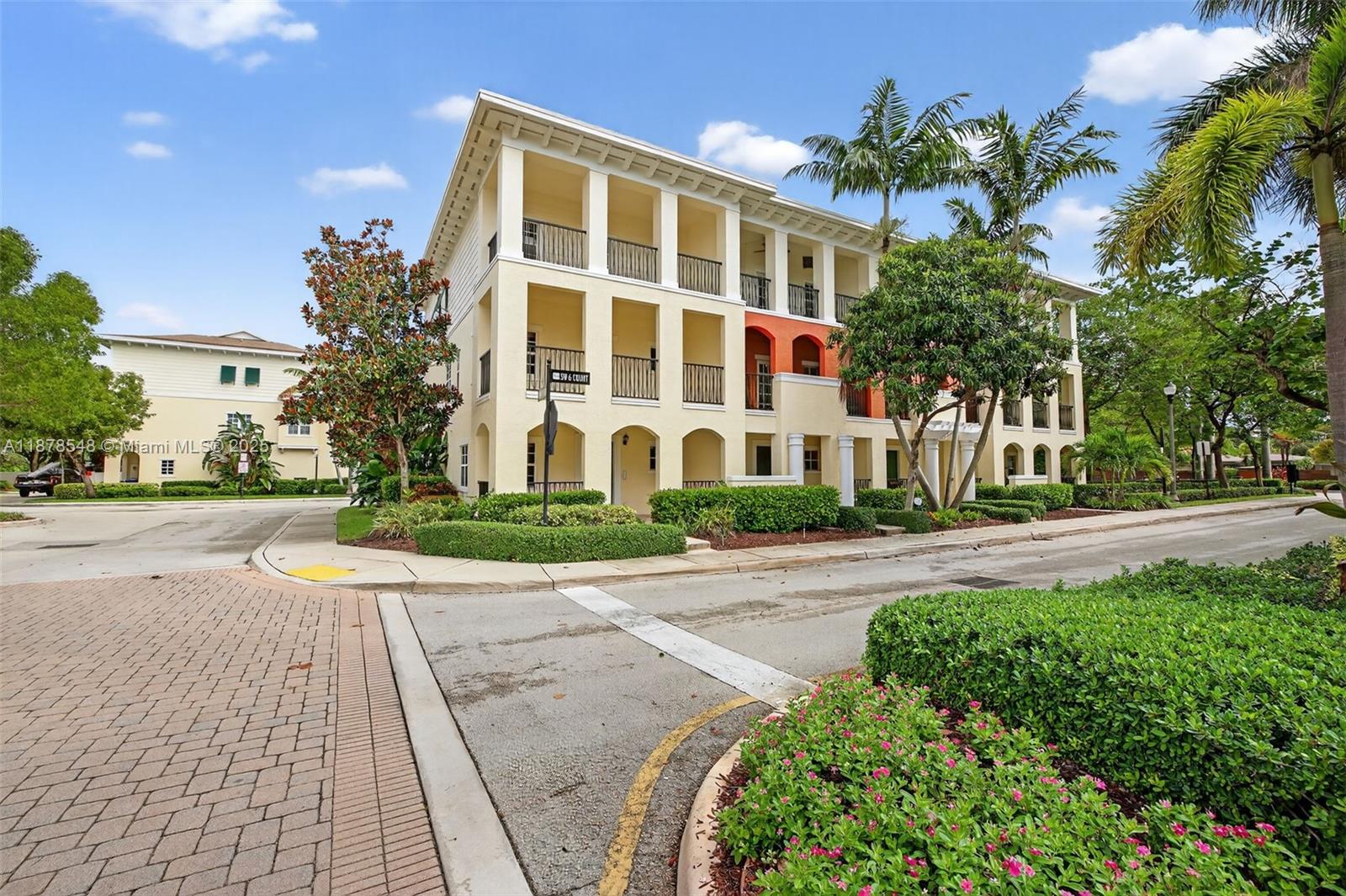 27 Southwest 6th Court Pompano Beach, FL 33060 - Photo 36 of 70 a view of a building with a yard