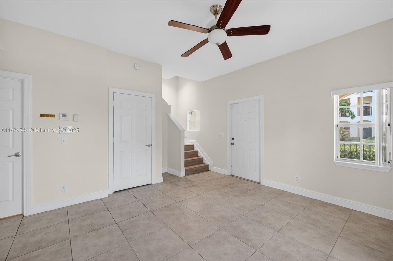 27 Southwest 6th Court Pompano Beach, FL 33060 - Photo 43 of 70 a view of an empty room with a window