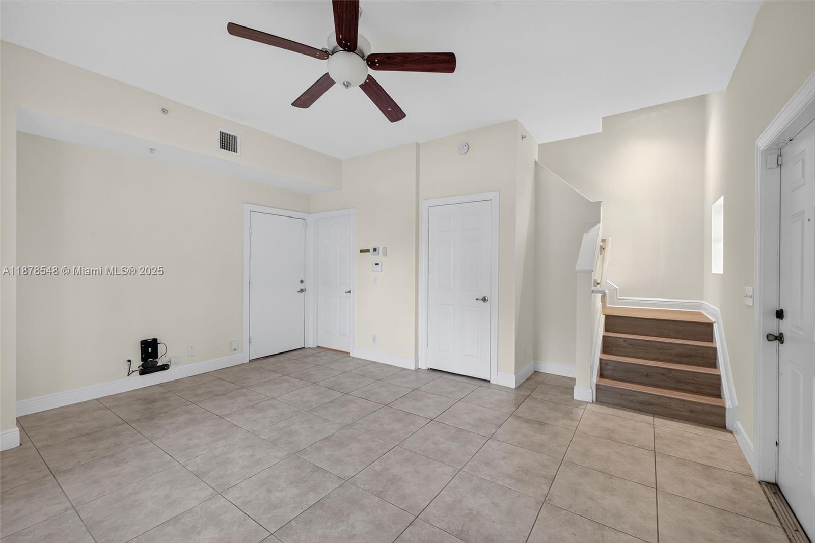 27 Southwest 6th Court Pompano Beach, FL 33060 - Photo 44 of 70 wooden floor in an empty room