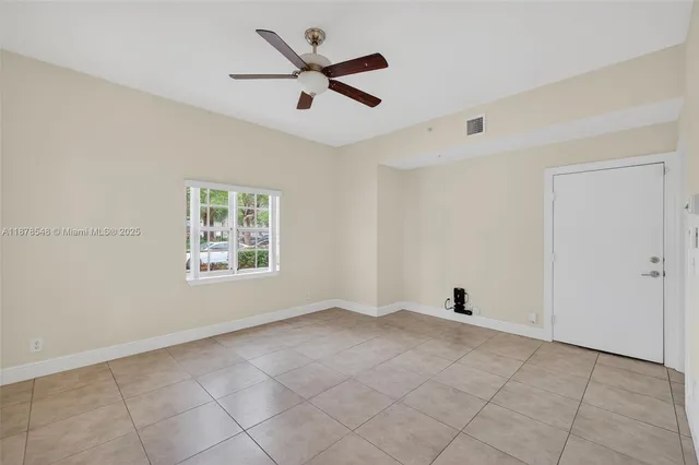 an aerial view of residential building and lake