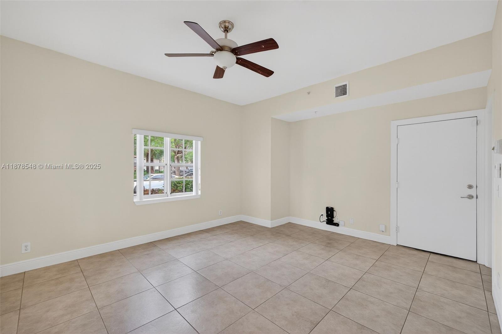 27 Southwest 6th Court Pompano Beach, FL 33060 - Photo 45 of 70 a view of an empty room with a window