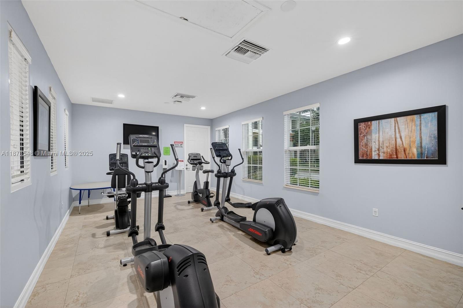 27 Southwest 6th Court Pompano Beach, FL 33060 - Photo 53 of 70 a view of a room with gym equipment