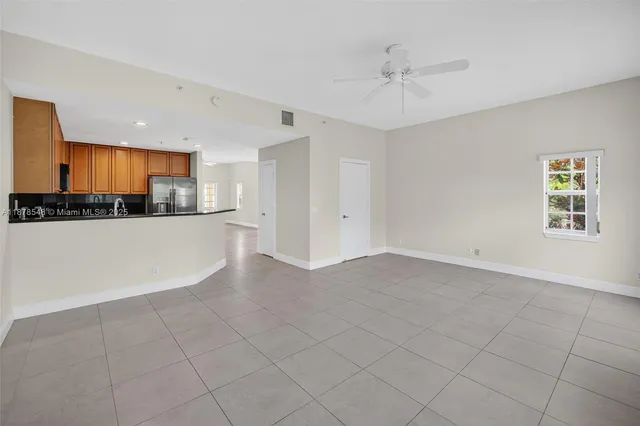 a view of a kitchen with a sink cabinets and a window