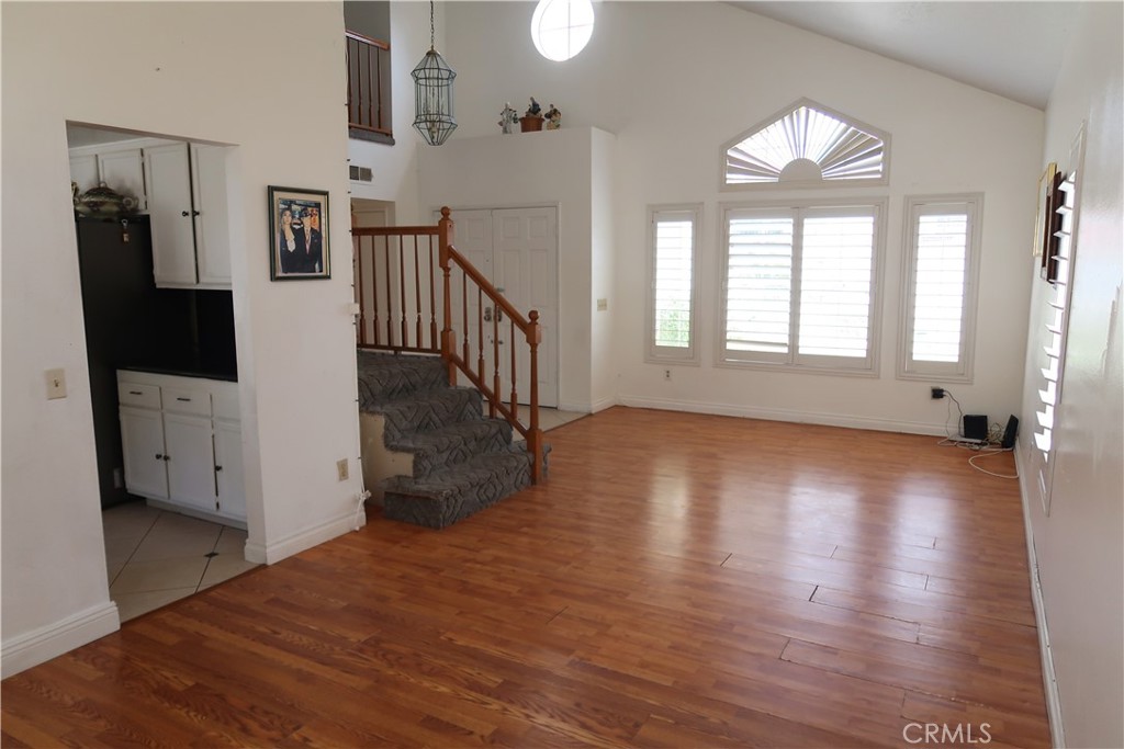 628 Pantera Drive Diamond Bar, CA 91765 - Photo 7 of 8 wooden floor in an empty room with a window and wooden floor