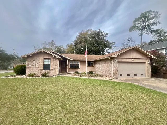 a house view with a outdoor space