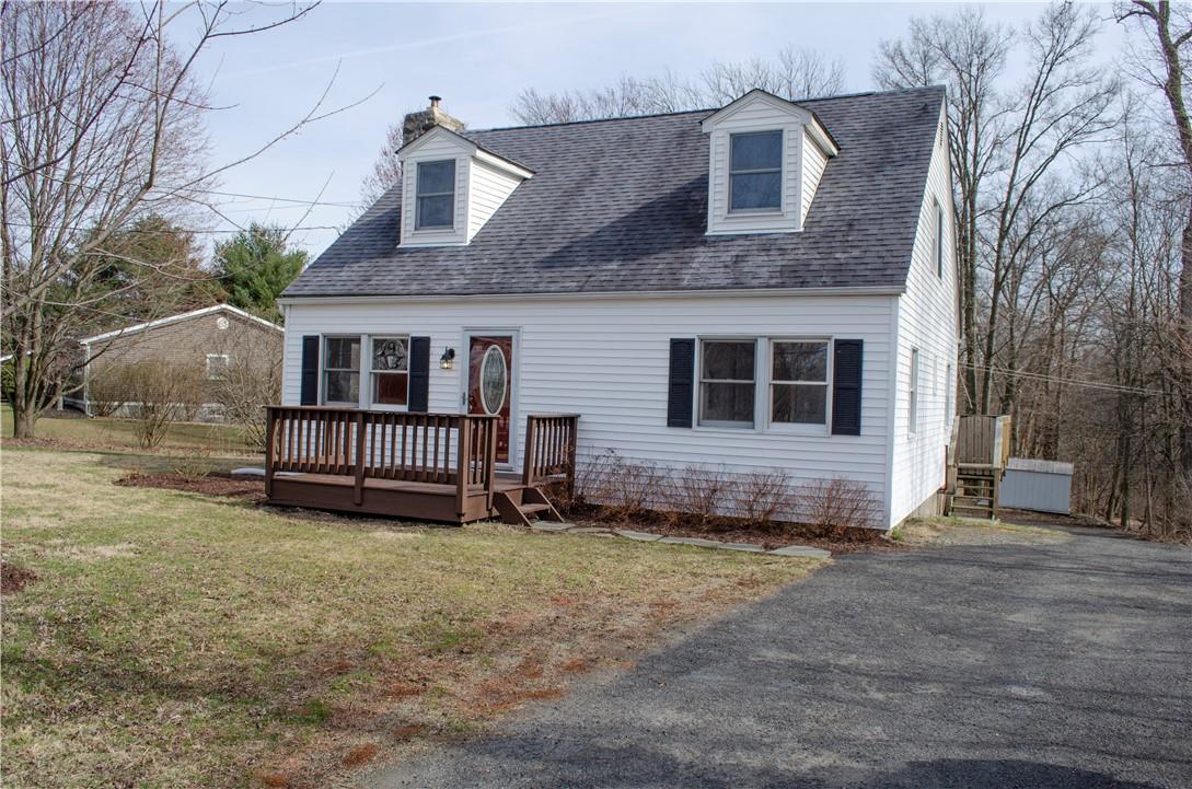 824 Ridgebury Road Slate Hill, NY 10973 - Photo 1 of 1 a front view of a house with a yard