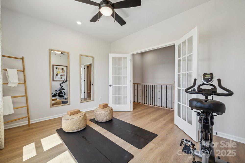 3150 Beacon Hts Road Indian Land, SC 29707 - Photo 19 of 28 a living room with furniture and wooden floor