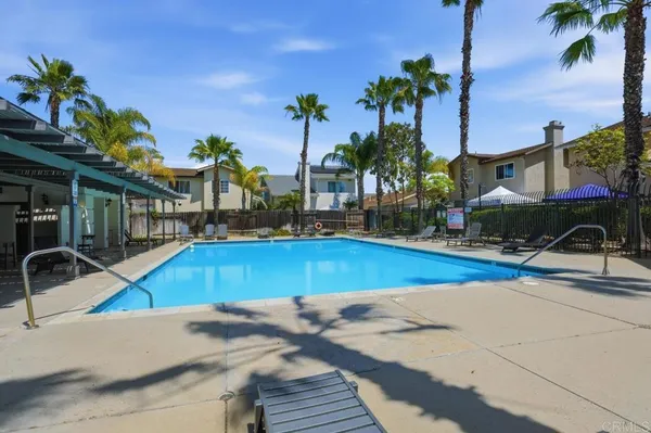 a view of a house with swimming pool