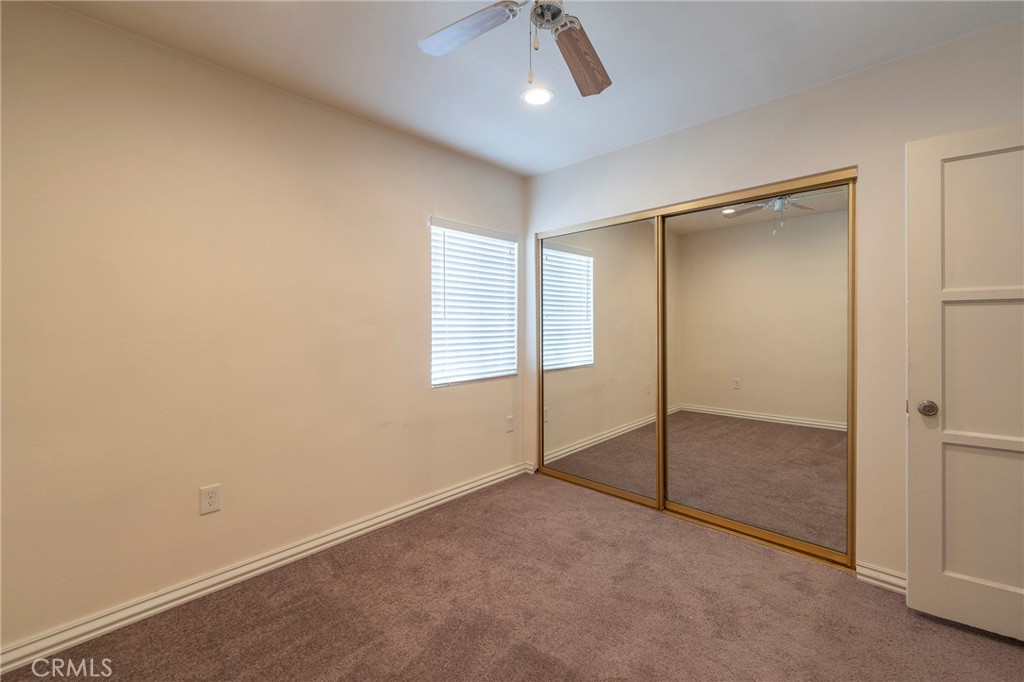 2734 West Caldwell Street Compton, CA 90220 - Photo 21 of 39 a view of an empty room with a window