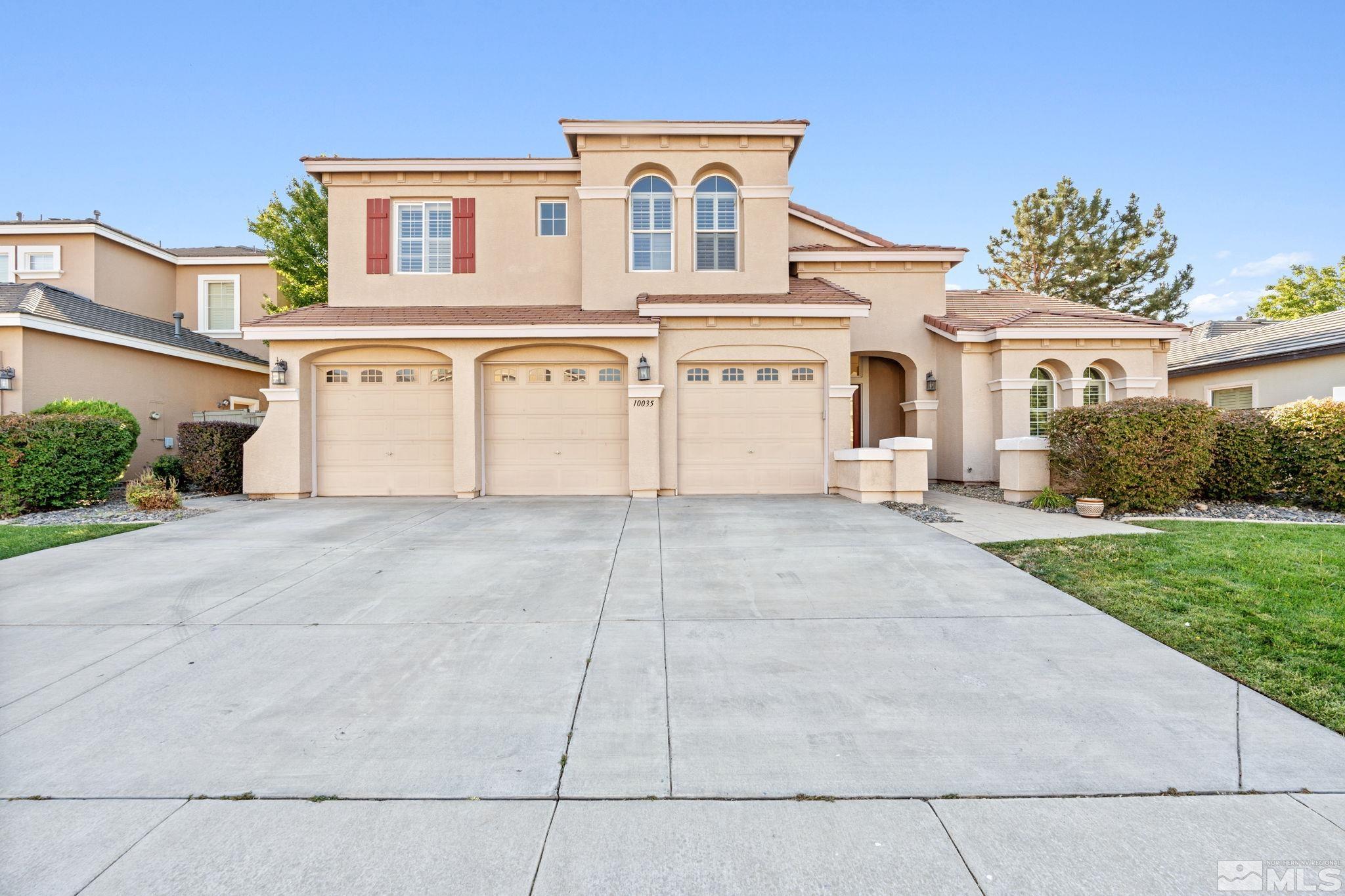 10035 Goler Wash Court Reno, NV 89521 - Photo 1 of 40 a view of white house with a yard