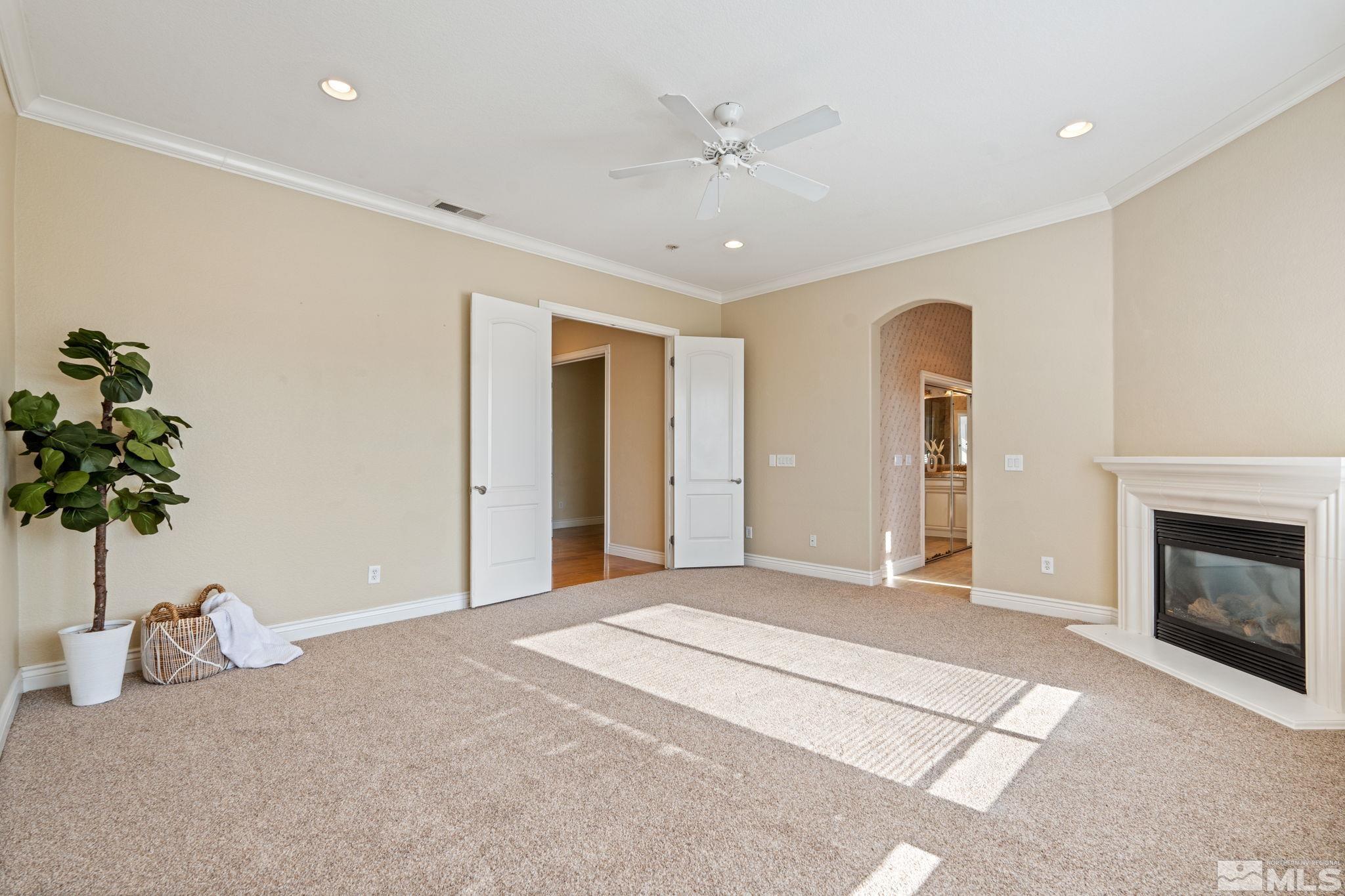 10035 Goler Wash Court Reno, NV 89521 - Photo 33 of 40 a view of an empty room with a fireplace