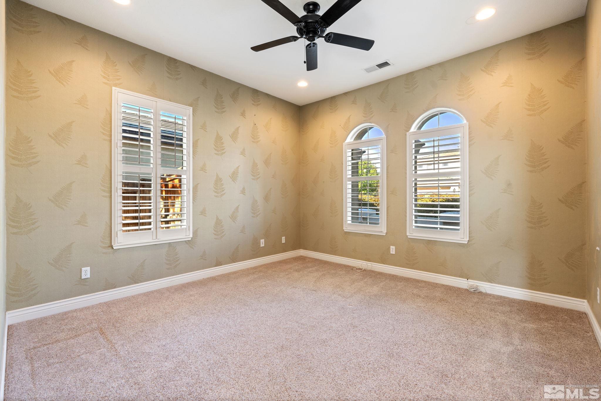 10035 Goler Wash Court Reno, NV 89521 - Photo 39 of 40 a view of a livingroom with a window