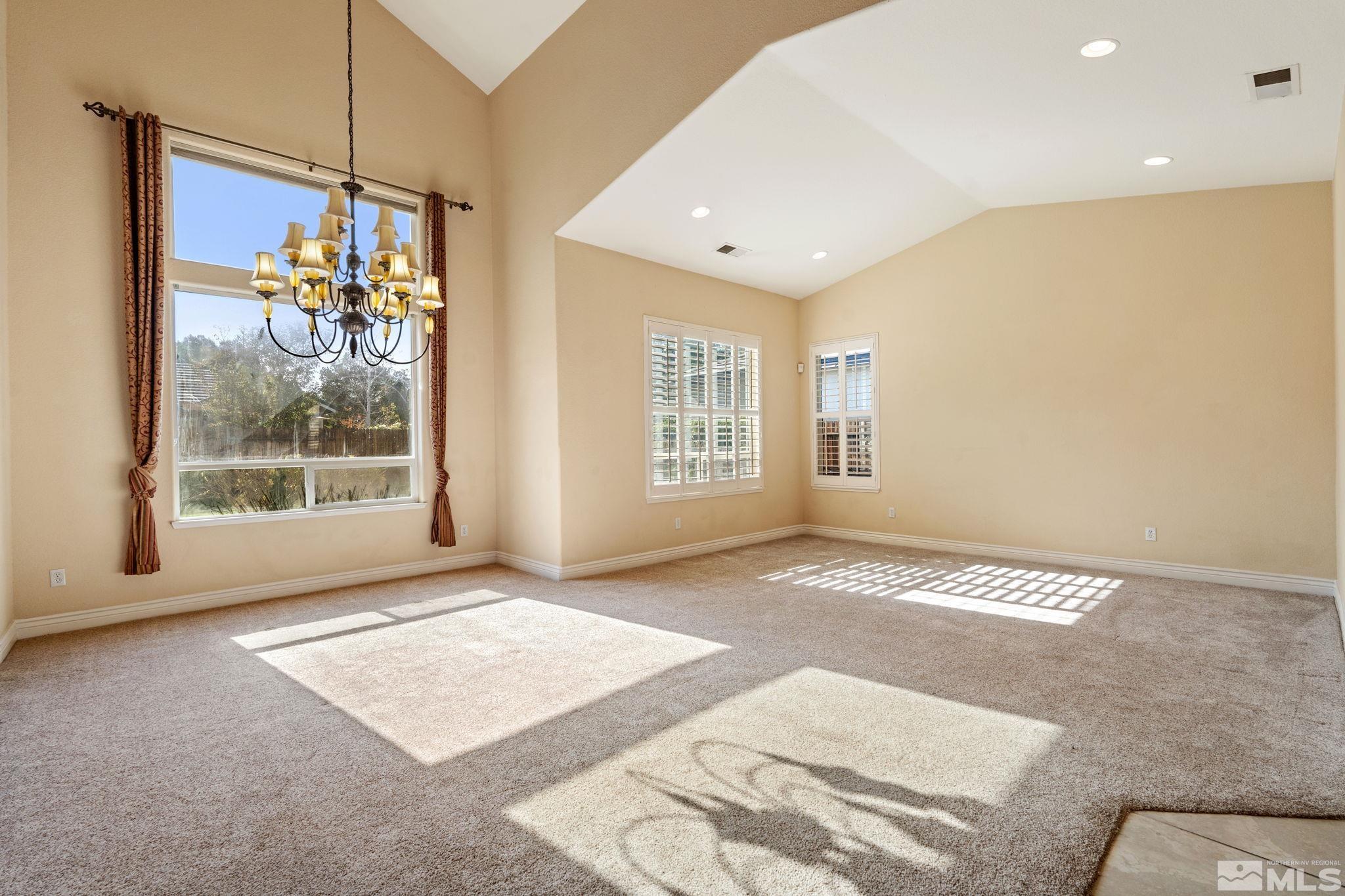 10035 Goler Wash Court Reno, NV 89521 - Photo 9 of 40 a view of an empty room with a window