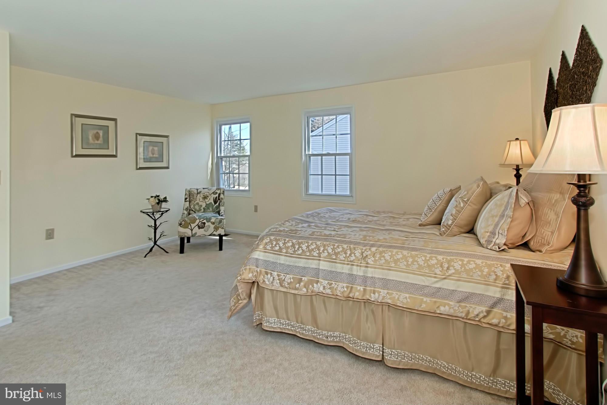 9505 Burning Branch Road Burke, VA 22015 - Photo 17 of 30 a bedroom with a bed and window