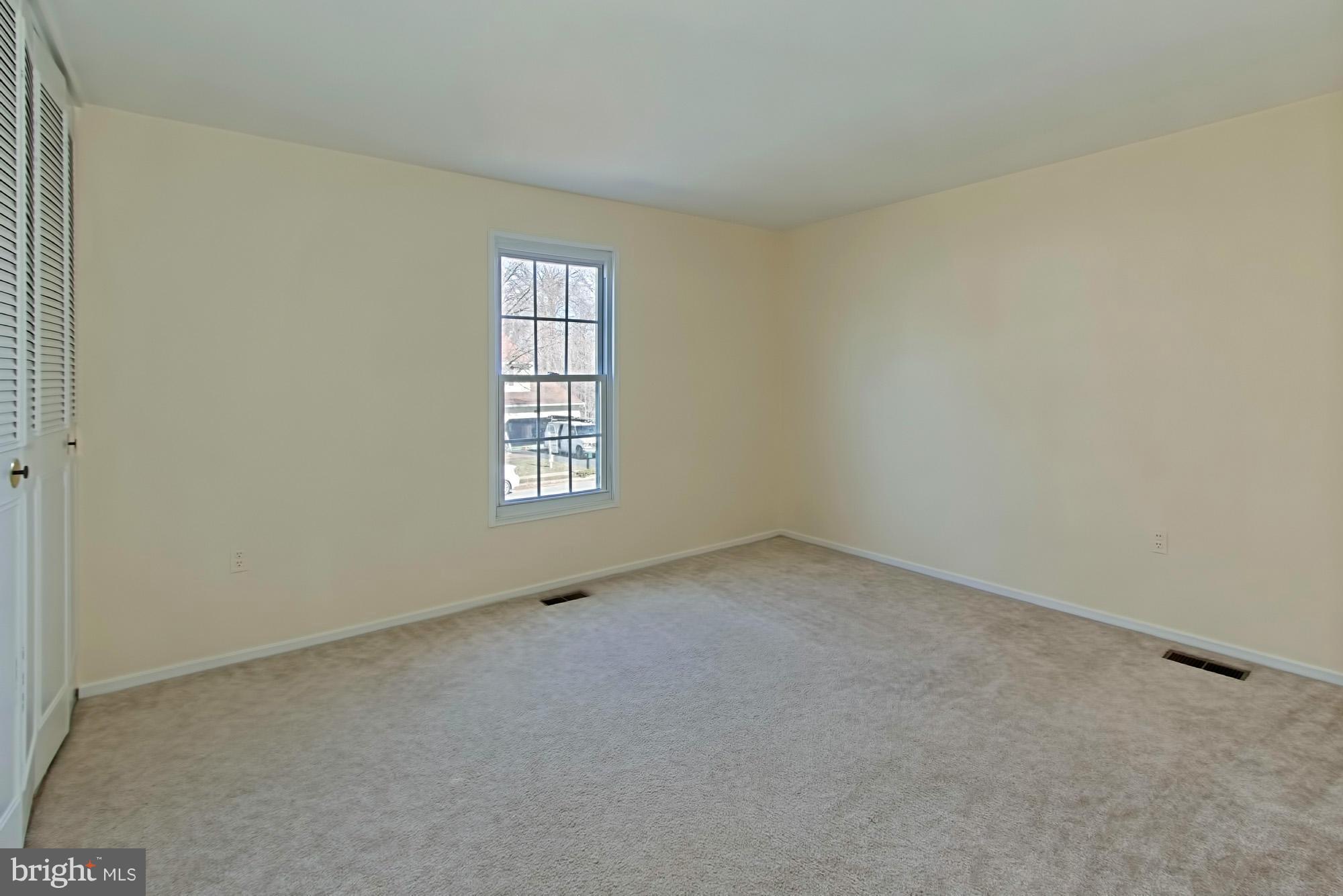 9505 Burning Branch Road Burke, VA 22015 - Photo 19 of 30 an empty room with a window