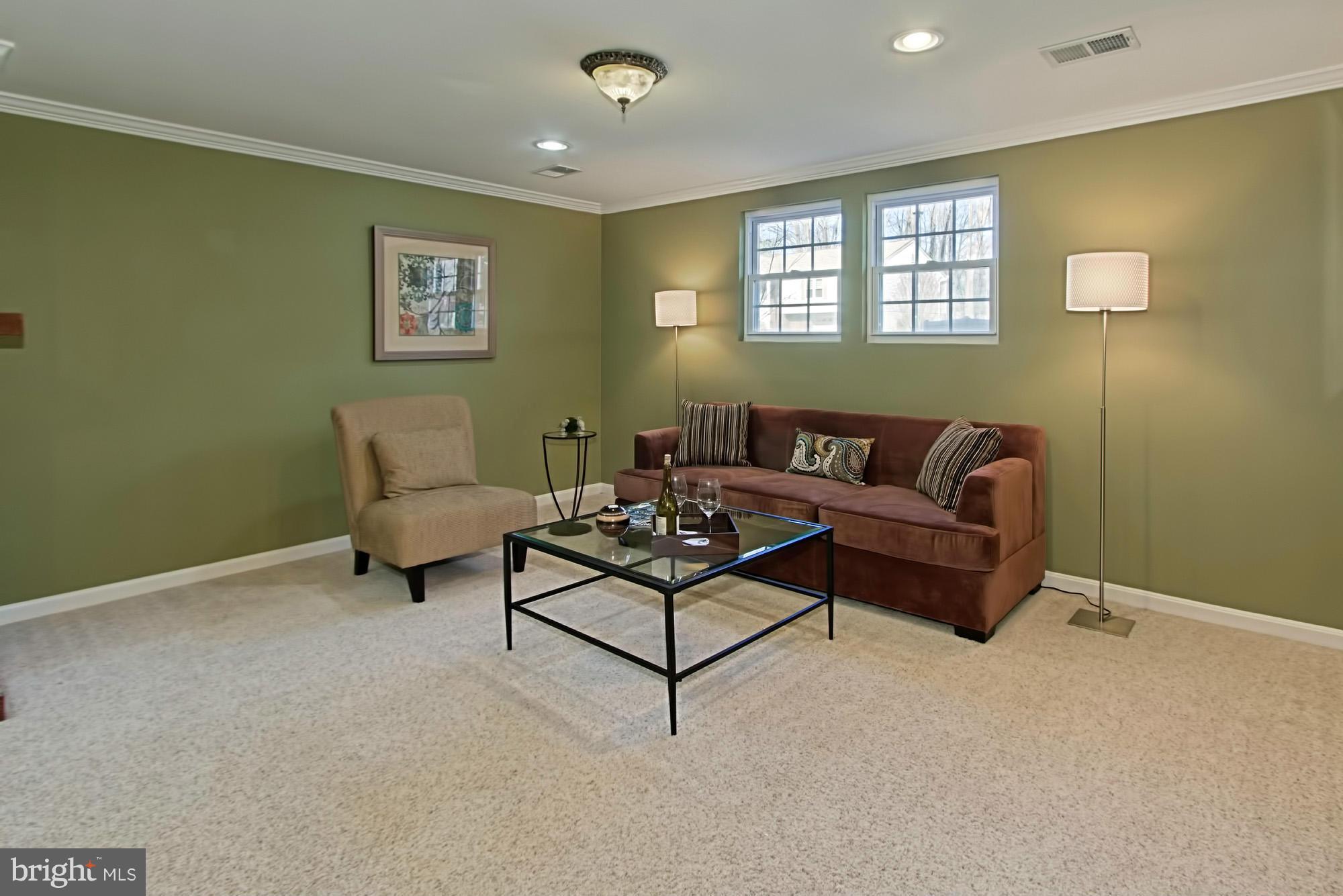 9505 Burning Branch Road Burke, VA 22015 - Photo 22 of 30 a living room with furniture