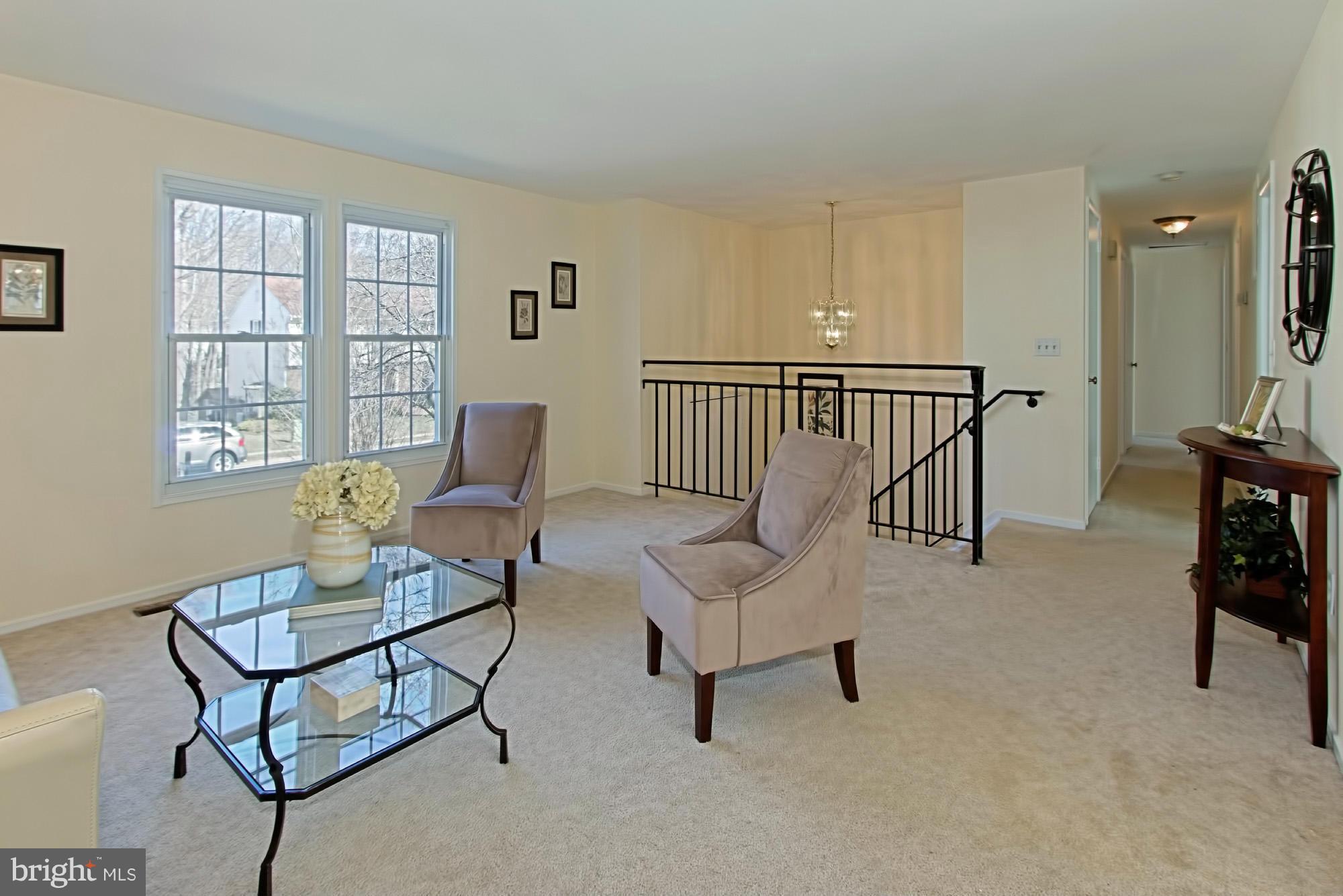 9505 Burning Branch Road Burke, VA 22015 - Photo 6 of 30 a living room with furniture and a window