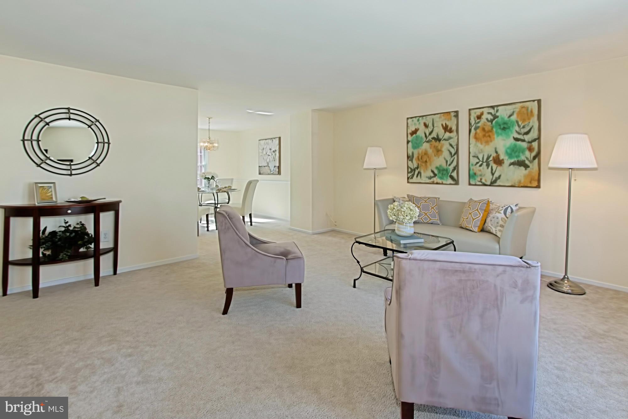9505 Burning Branch Road Burke, VA 22015 - Photo 8 of 30 a living room with furniture and a window