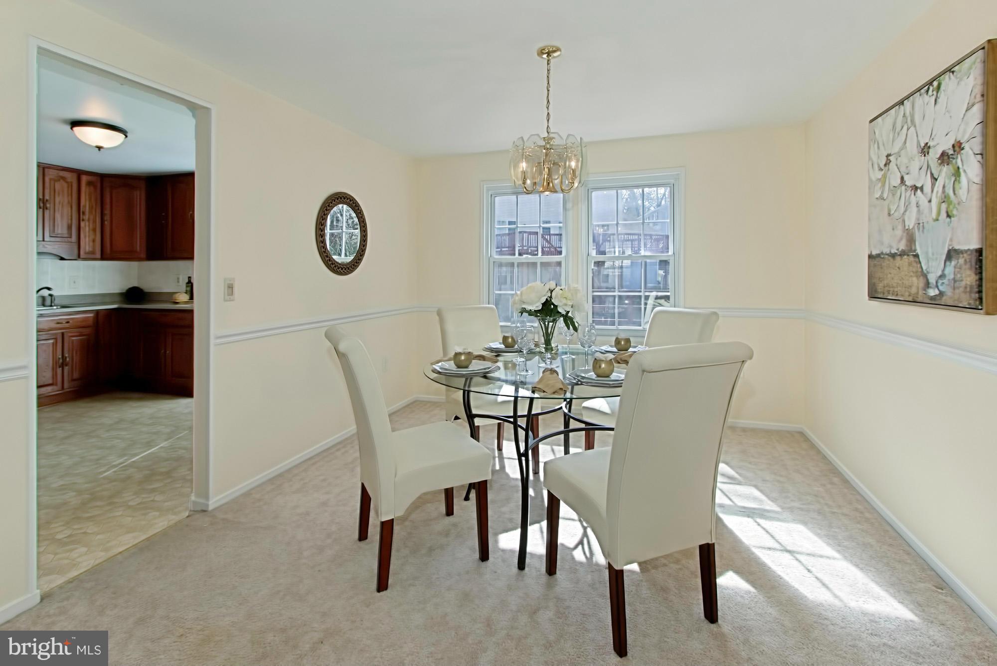 9505 Burning Branch Road Burke, VA 22015 - Photo 9 of 30 a view of a dining room with furniture