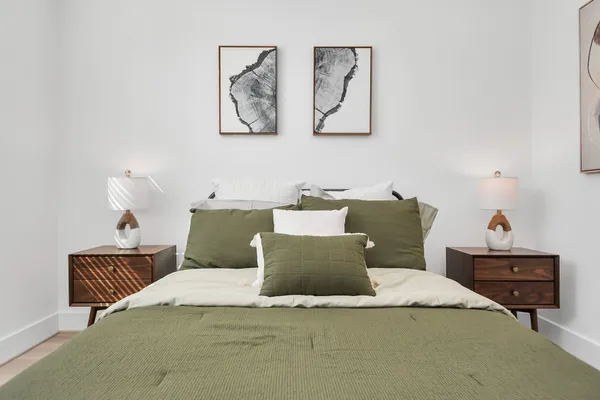 a bathroom with a sink toilet tub and shower
