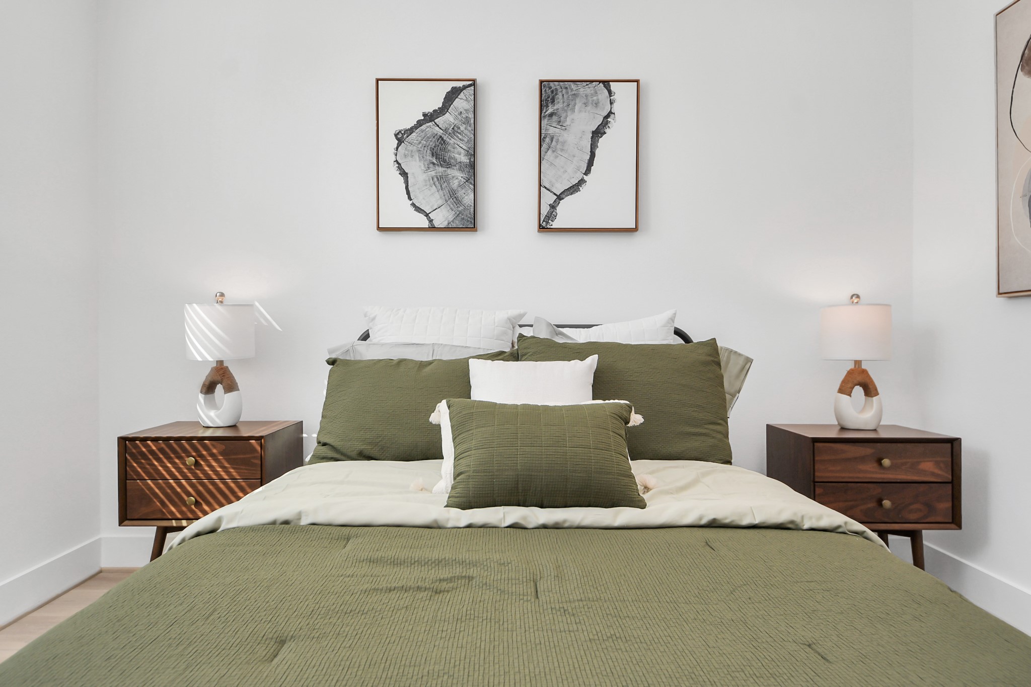 2524 Live Oak Street Houston, TX 77004 - Photo 11 of 50 a bed room with a bed and painting on the wall