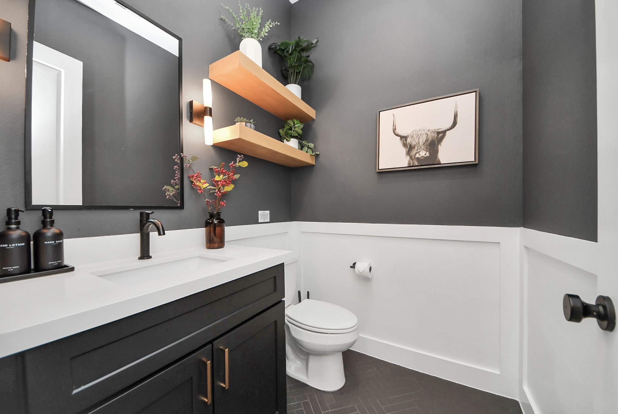 2524 Live Oak Street Houston, TX 77004 - Photo 14 of 50 a bathroom with a toilet sink and mirror