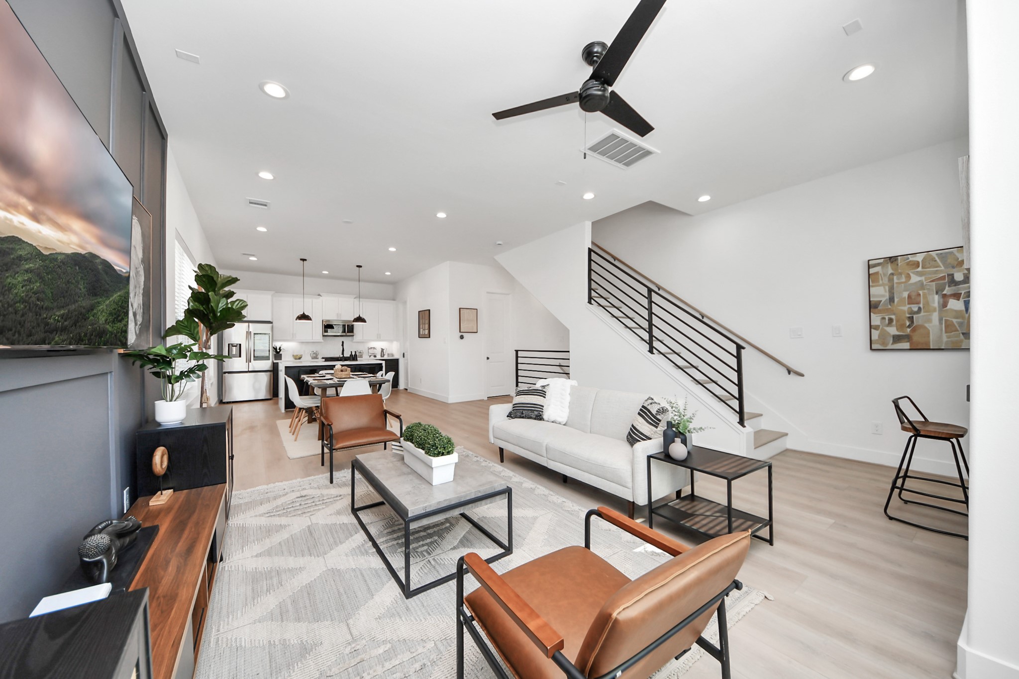 2524 Live Oak Street Houston, TX 77004 - Photo 23 of 50 a living room with furniture and a wooden floor