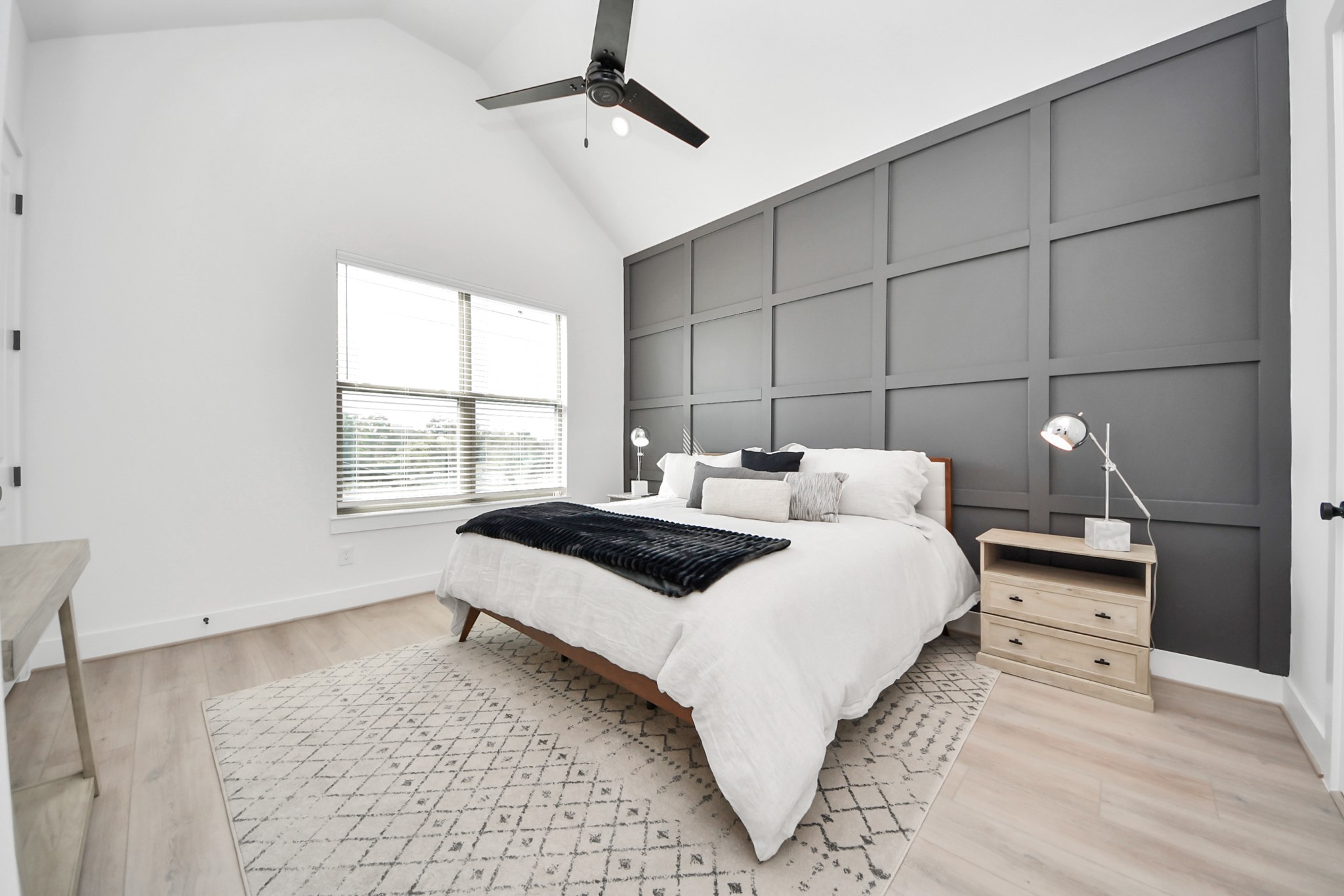 2524 Live Oak Street Houston, TX 77004 - Photo 38 of 50 a bedroom with a bed and window