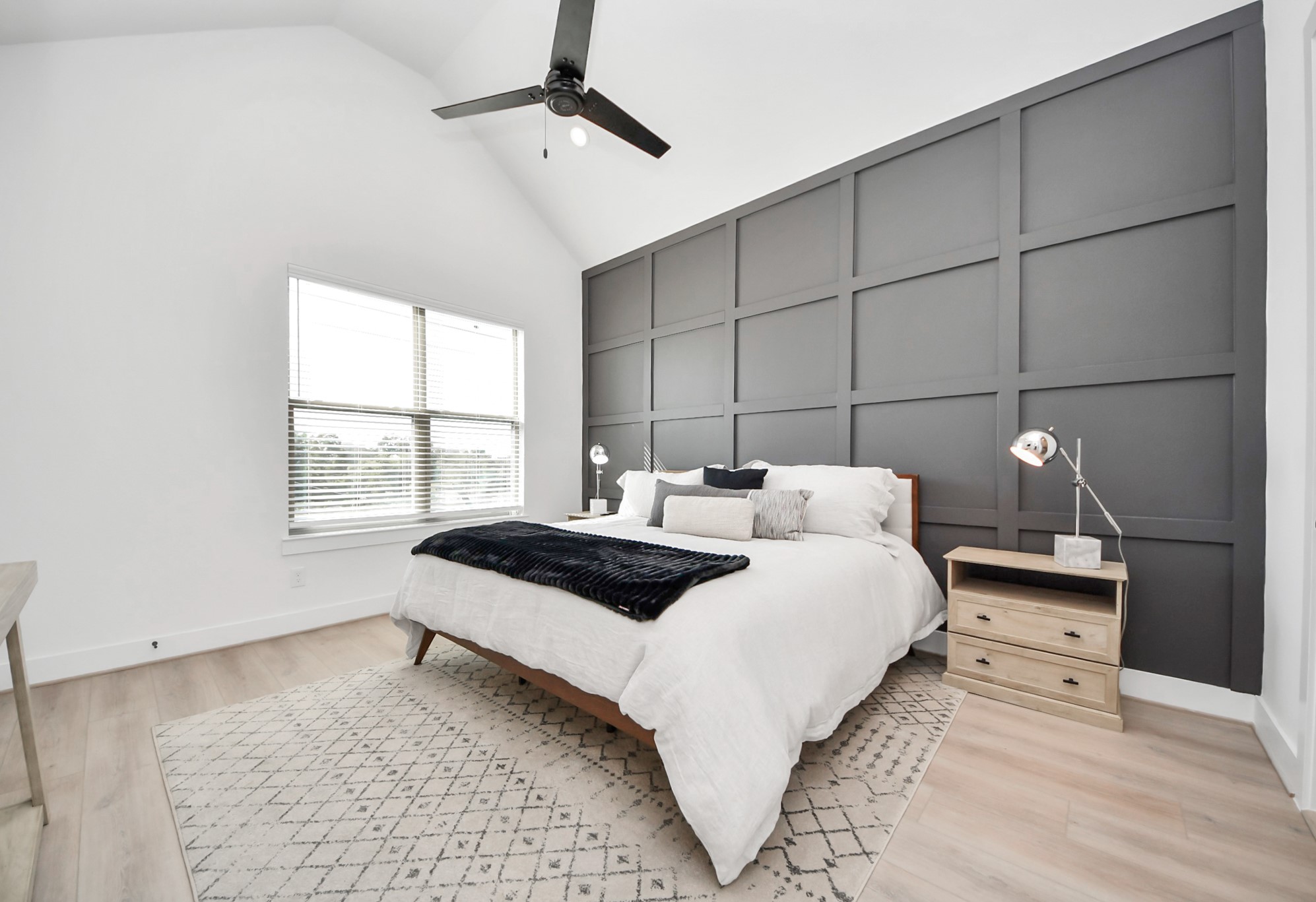 2524 Live Oak Street Houston, TX 77004 - Photo 41 of 50 a bedroom with a bed and window