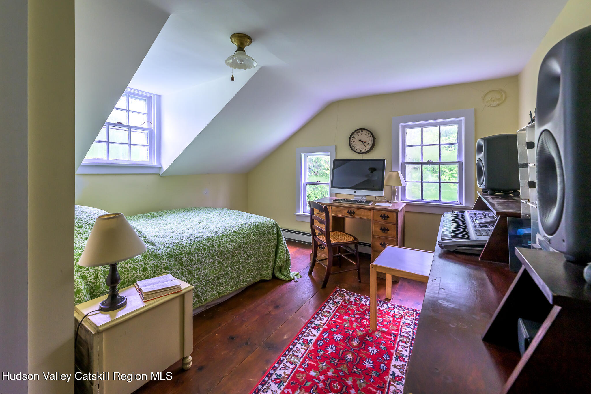 1250 County Rte 351 Rensselaerville, NY 12147 - Photo 18 of 26 a living room with furniture and a flat screen tv