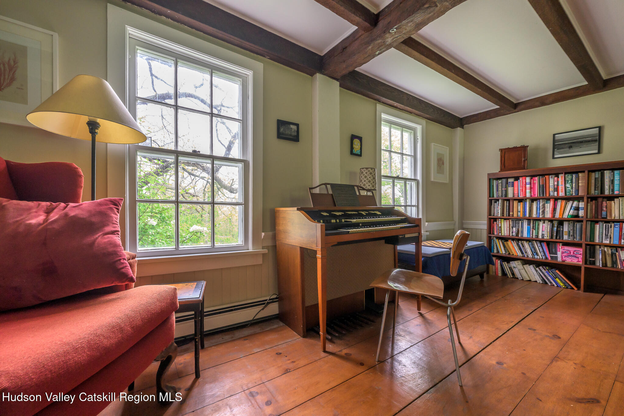 1250 County Rte 351 Rensselaerville, NY 12147 - Photo 7 of 26 a livingroom with workspace and a window