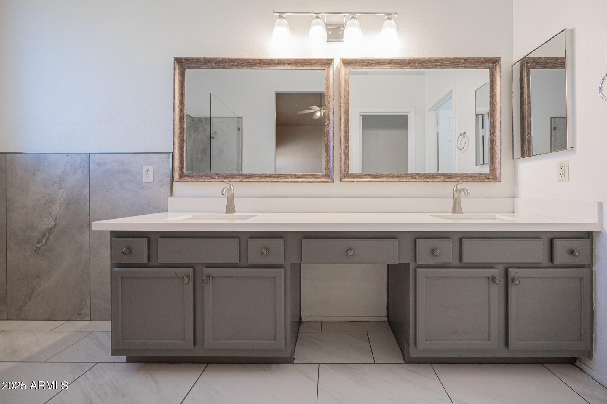 730 West Kent Place Chandler, AZ 85225 - Photo 14 of 29 a bathroom with a sink and a mirror