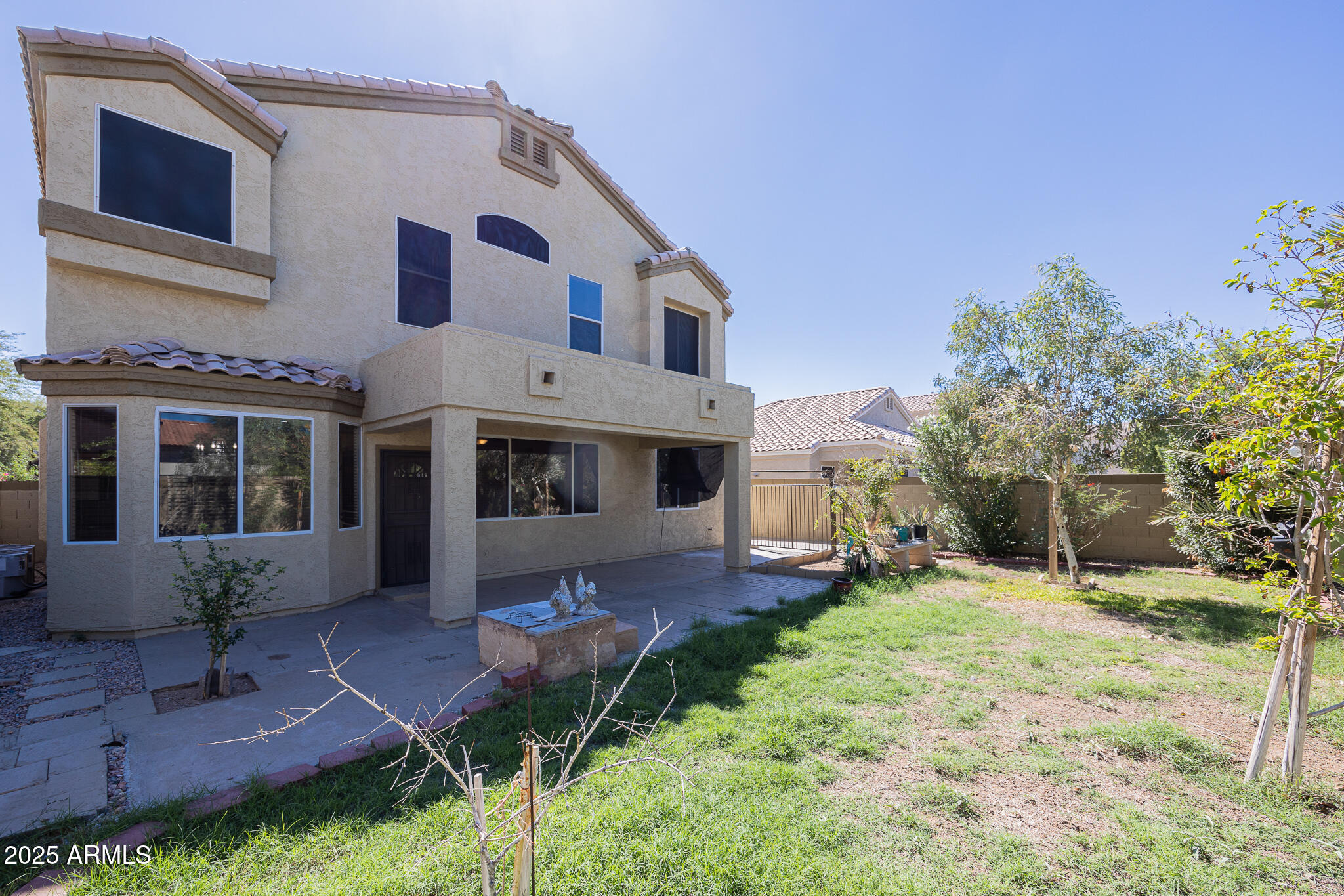 730 West Kent Place Chandler, AZ 85225 - Photo 27 of 29 a front view of a house with a yard and porch