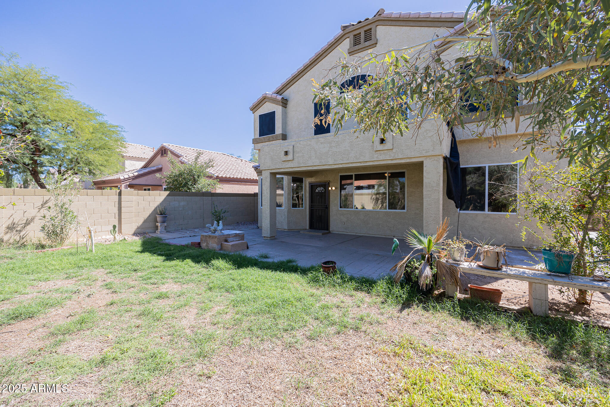 730 West Kent Place Chandler, AZ 85225 - Photo 28 of 29 a front view of a house with garden